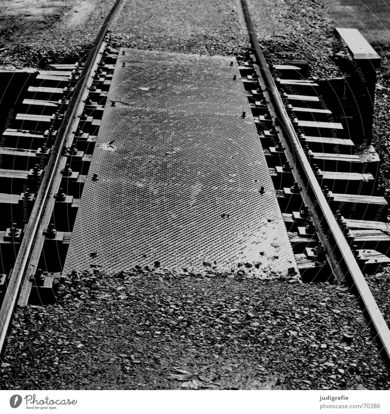 No deviation possible Railroad tracks Gravel Silhouette Steel Direction Black White Driving Wet Tin Covers (Construction) Regulation Lanes & trails Bridge Stone