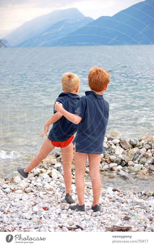 beach games Lake Waves Lake Garda Italy Dolomites Vacation & Travel Brother Family & Relations Ocean Beach Playing Boy (child) Red Child Fog Friendship Clouds