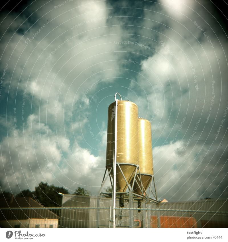 once, twice, very nice Silo Clouds Green Building Bad weather Holga Sky green green grass Sun Industrial Photography Gold cloudy