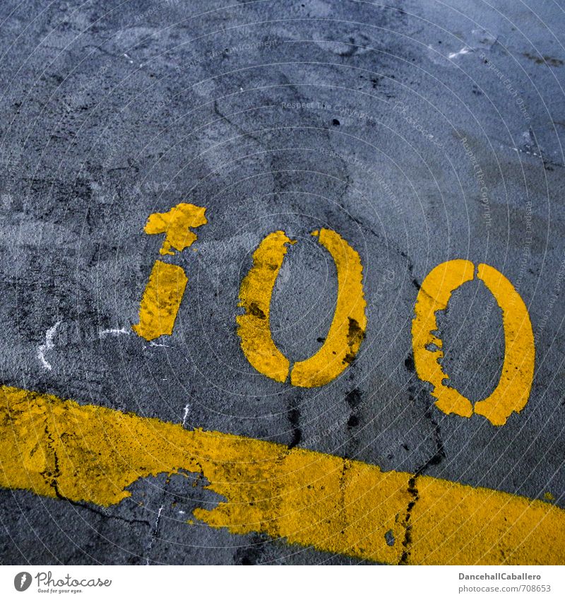 one hundred *100 :-) Traffic infrastructure Street Parking lot Underground garage Stone Concrete Sign Digits and numbers Signs and labeling Line Stripe Yellow