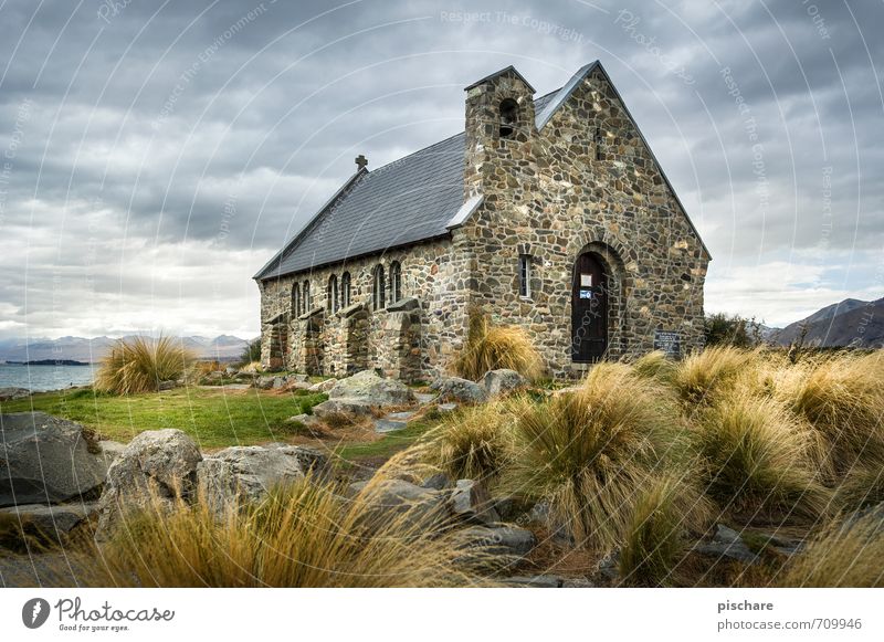 Church of the good shepherd Landscape Clouds Bad weather Manmade structures Tourist Attraction Dark Vacation & Travel New Zealand Lake Tekapo Colour photo