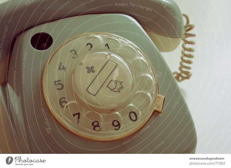 gotten rid of Telephone Rotary dial Gray Old-school Retro Seventies Archaic Style Decoration Lie Yellowed Out of service Broken ring ring Digits and numbers