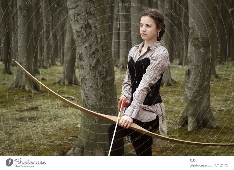 archer Archer Feminine Young woman Youth (Young adults) 1 Human being 18 - 30 years Adults Forest Brunette Bow Arrow Observe Wait Athletic Brown Green Willpower