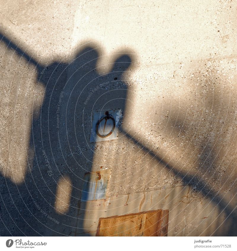 shadow 2 Together Wall (building) Wall (barrier) Concrete Light Shadow Human being Couple Handrail Line Circle Metal Rust Sun In pairs
