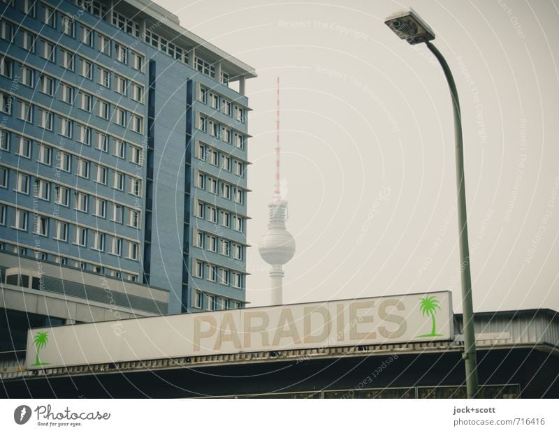 Nirvana in the urban jungle Downtown Berlin Facade Landmark Berlin TV Tower Lightbox Uniqueness Retro Paradise Word Oasis Pictogram Subdued colour