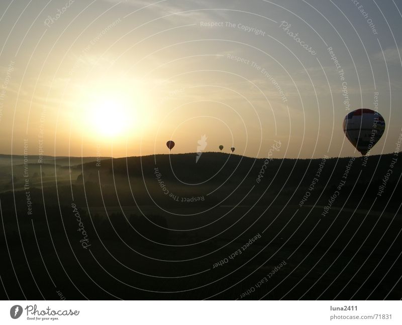 Balloon flight in the morning 1 Driving Sunrise Fog Ground fog Fog bank Light Back-light Stairs Landscape Sky Floor covering Hot Air Balloon