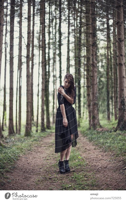 young woman in the woods Feminine Young woman Youth (Young adults) 1 Human being 18 - 30 years Adults Nature Forest Fashion Dress Dark Thin pretty Loneliness