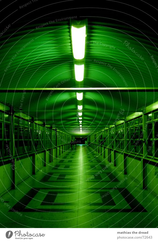 It's a long way to the goal. Friedrichshain Tunnel Tunnel vision Window Light Neon light Loneliness Symmetry Pattern Square Dark Dangerous Vanishing point Night
