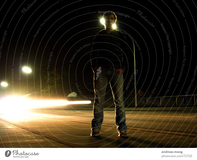 Standing at the road - Pt. I Light Woman Dark Stripe Street lighting Lantern Speed Loneliness Illuminate Lighting Edge Night standing Car motion Movement almost