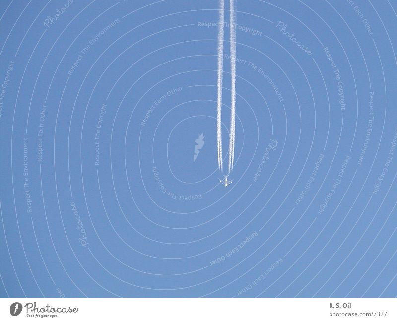 Detached Airplane Means of transport Transport Sky Blue Vapor trail