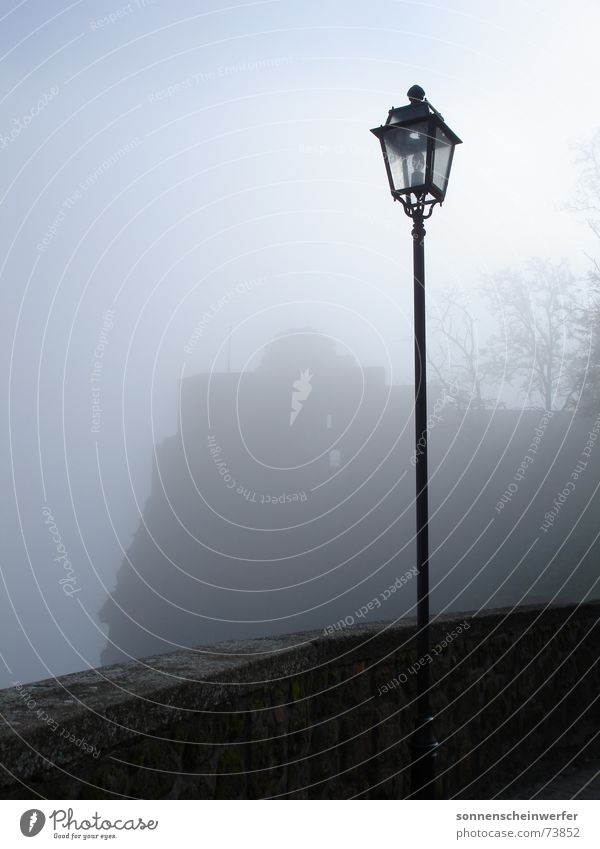 Lantern post at the Pozzo di San Patrizio in Umbria Lamp post Fog Dark Vantage point Exterior shot Sadness