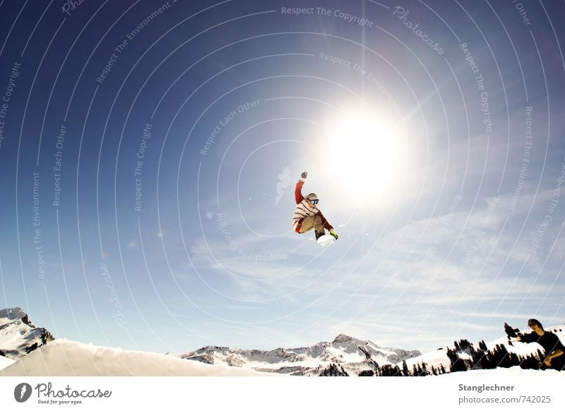 Jump to the sun Tourism Adventure Snow Winter vacation Sports Snowboard Sporting Complex Ski run Human being Masculine 2 To fall Athletic Blue Yellow Black