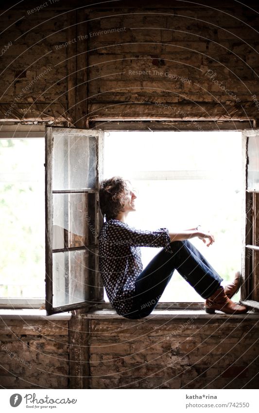 Attractive, self-confident woman sits on window sill of old roof truss and enjoys the sun. Human being Feminine Young woman Youth (Young adults) 1 18 - 30 years