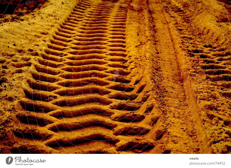 My tracks in the sand Tracks Relief Ochre Beige Yellow Pattern Excavator Sand Gold Construction site baaustelle gravel hollow