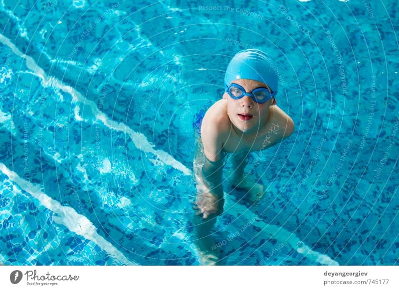 Little boy in swimming poo Joy Happy Leisure and hobbies Playing Vacation & Travel Summer Sports Swimming pool Child School Boy (child) Infancy Smiling