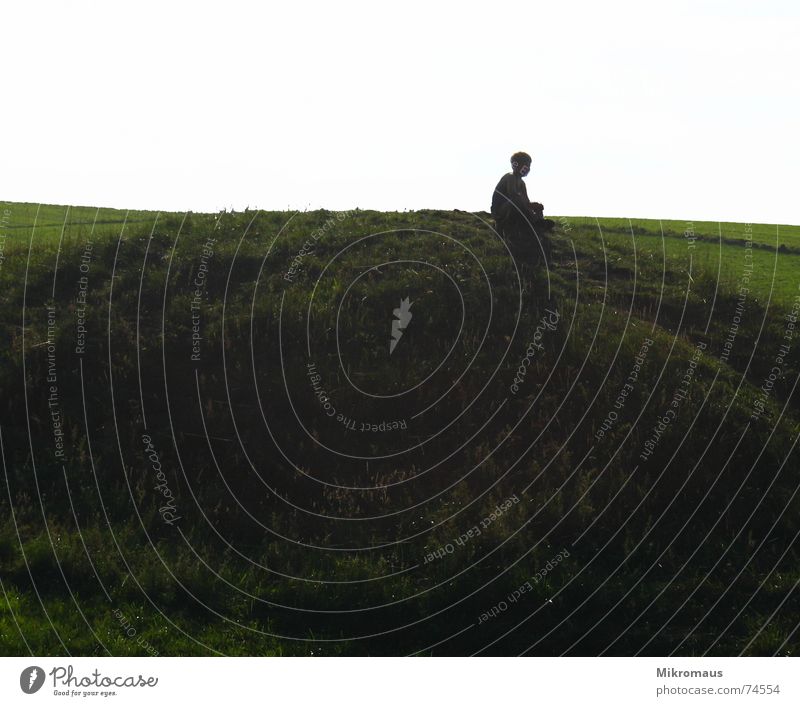 solitary Loneliness Looking Boy (child) Evening sun Sunset Mountain Hill Meadow Shadow Back-light Far-off places Child Dusk