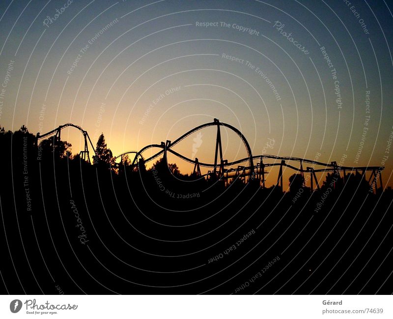 roller coaster ride at sunset Sunset Roller coaster Twilight Visual spectacle Dream contre-jour