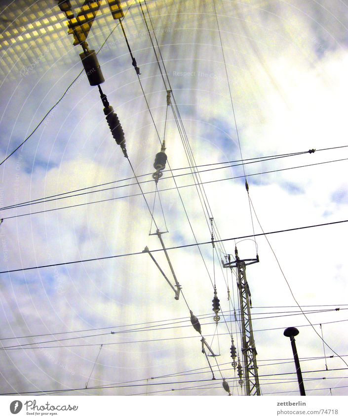 City / Country - The City Overhead line Electricity Railroad Worm's-eye view Clouds Reflection Americas electrification e-lok Sky Window pane