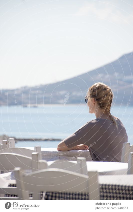 Woman sitting at table in Greece Restaurant Sit Bistro Table Café Well-being Young woman Vacation & Travel Contentment Relaxation Calm Tourism Summer