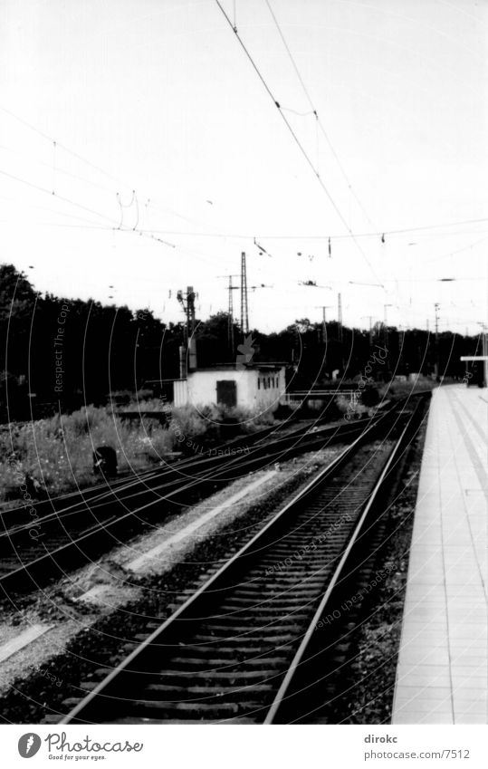 line up...? Railroad tracks Metal Train station