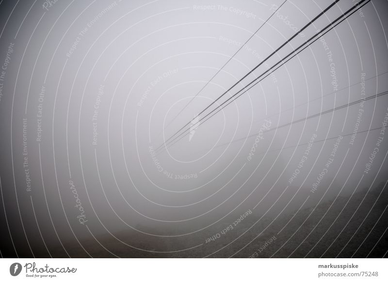 nebula gondola Fog Peak South Tyrol Wire cable Weather Rope Mountain Steel cable Cable car Building line Vanishing point Downward Bright background Vignetting