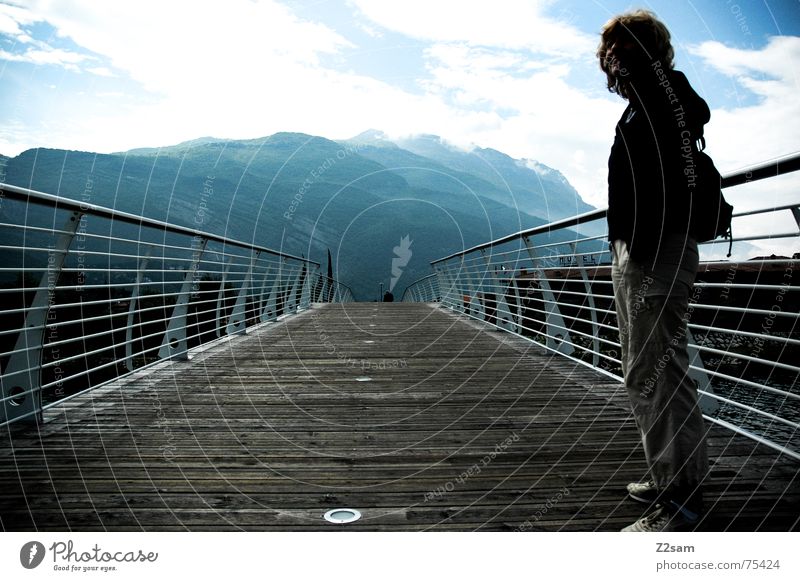 on bridges Woman Stand Above Going Wood Italy Lake Garda Human being Mountain Sky Sun way Lanes & trails Handrail Water