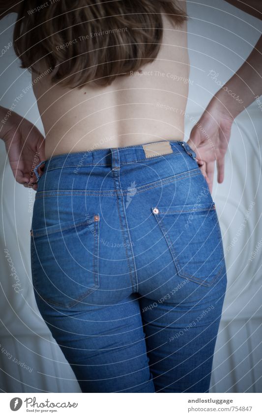 blue jeans. Style Feminine Young woman Youth (Young adults) Back Bottom 1 Human being 18 - 30 years Adults Fashion Jeans Brunette Long-haired Touch To hold on