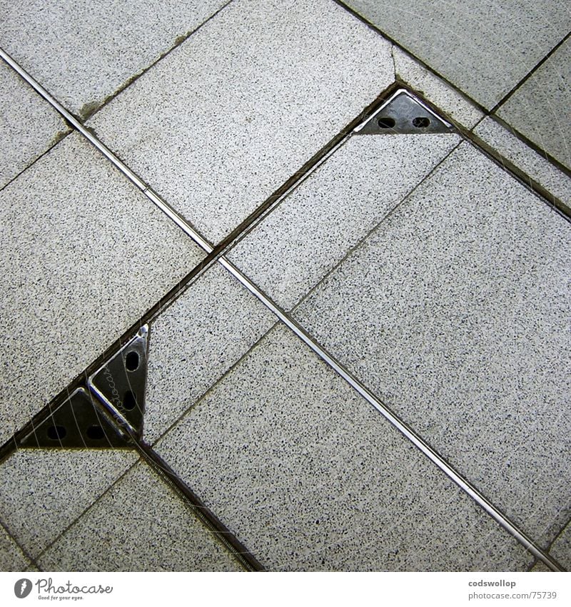 a grand day out Dance floor Gray Steel Gully Black Triangle Square Rectangle Geometry Success Train station Traffic infrastructure Floor covering tiles Tile