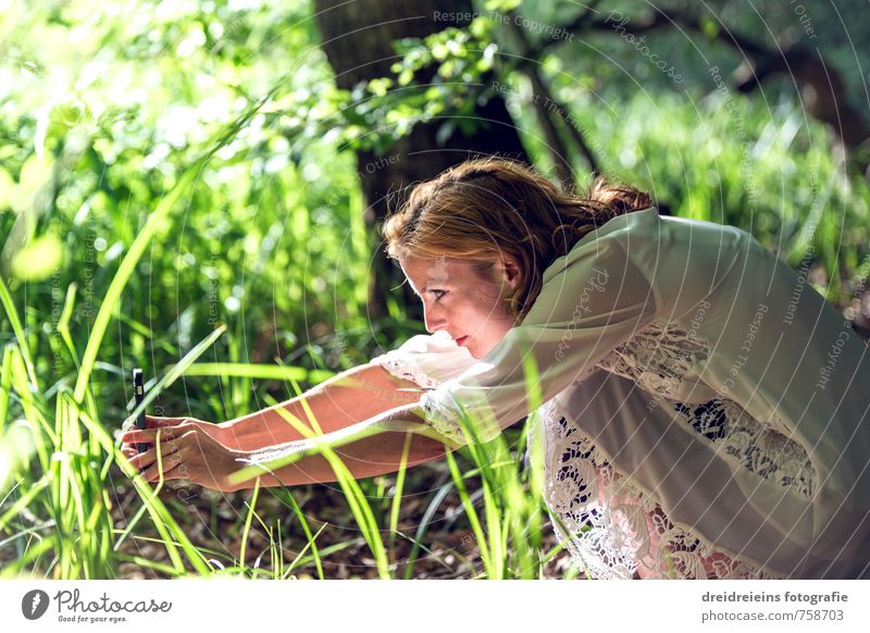 The photographer at work Human being Feminine Young woman Youth (Young adults) 1 Nature Plant Beautiful weather Grass Foliage plant Dress Observe Discover Sit