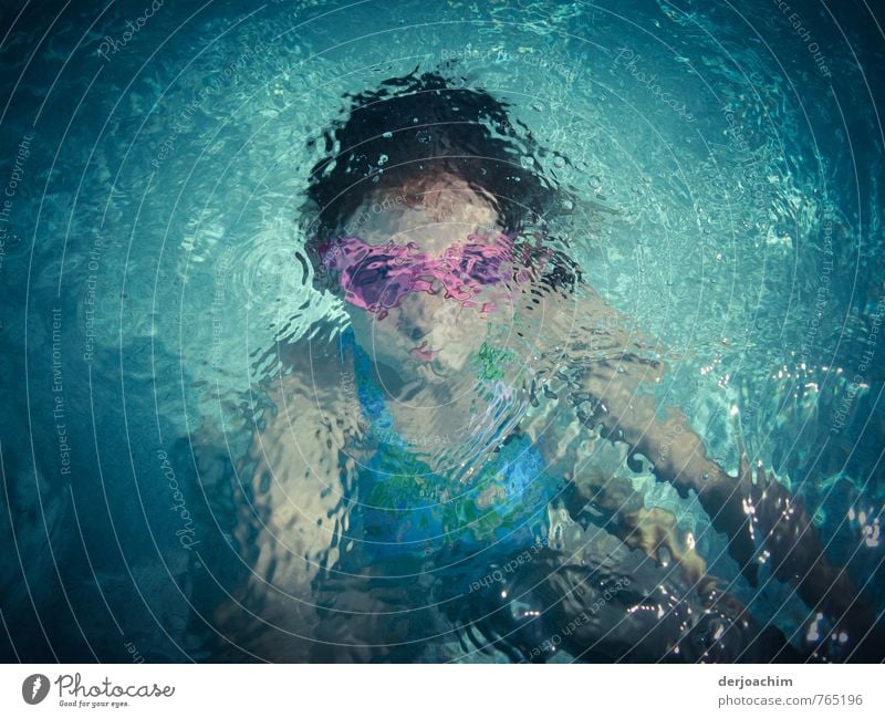 Girl under water with pink diving goggles and the sun is shining. -diving mouse - Joy Athletic Life Vacation & Travel Aquatics Swimming & Bathing Swimming pool