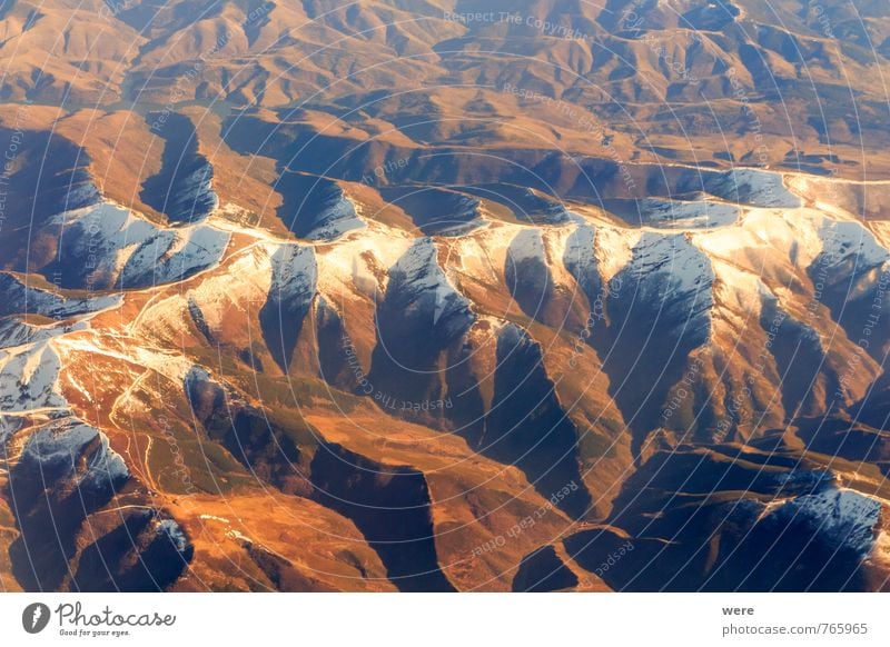 ridges Mountain Landscape Peak Snowcapped peak Aviation Airplane Flying Vacation & Travel flight Geography Subdued colour Aerial photograph Deserted