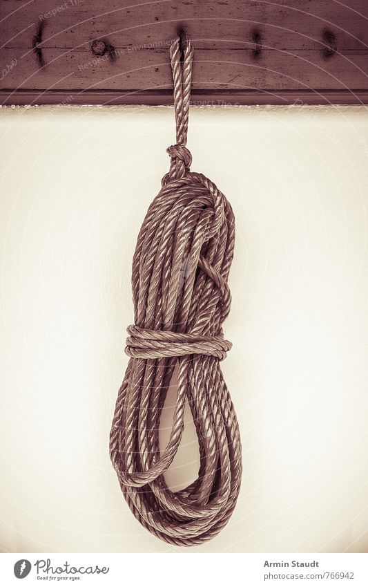 Ariadnes tool Wall (barrier) Wall (building) Rope Clothes peg Checkmark Knot Bundle Suspended Loop Hang Old Authentic Gloomy vintage Retro Color filter Sepia