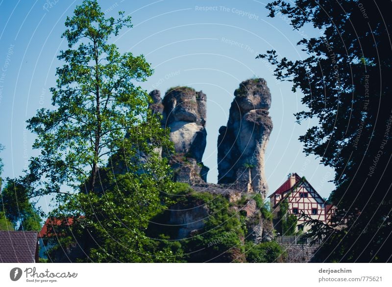 Franconian bears, Steinernes nature monument, look like bears, also a half-timbered house stands beside it, in Tüchersfeld - Franconia / Bavaria, Joy Calm