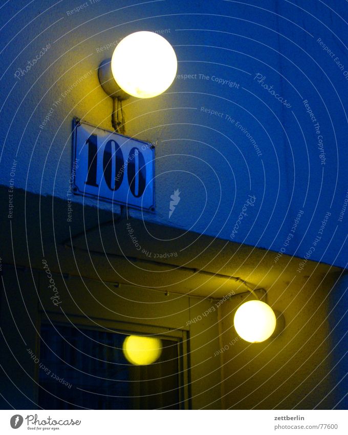100 Digits and numbers House number Jubilee Light Exterior lighting Glass door Reflection Night Dark Enamel sign Lighting Door Evening Blue Signs and labeling