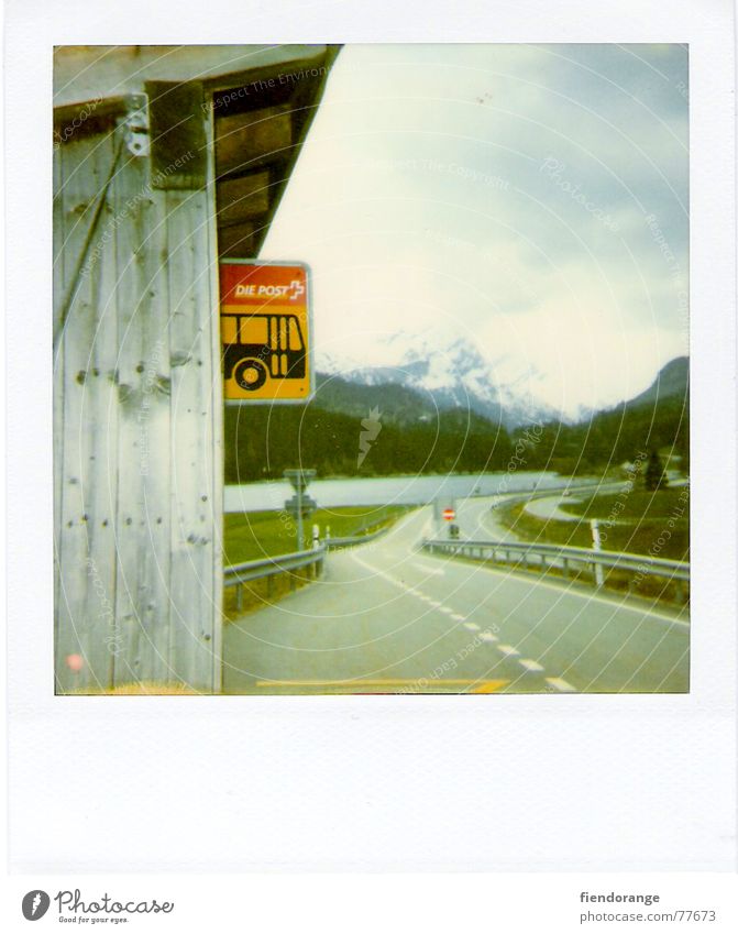 think dra lüt a Switzerland Bus stop Lake Air Signs and labeling Street Mountain snow:loneliness Polaroid