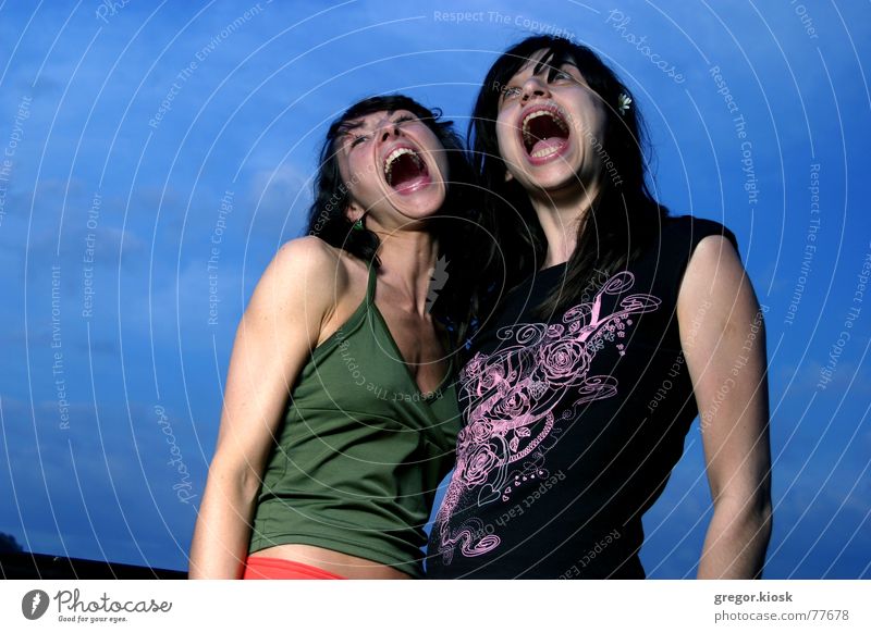 I wanna scream! Crazy Grinning Stupid Human being Portrait photograph Sky Jump Open silly funny Scream two Woman big screech shriek yell mad freeze picture