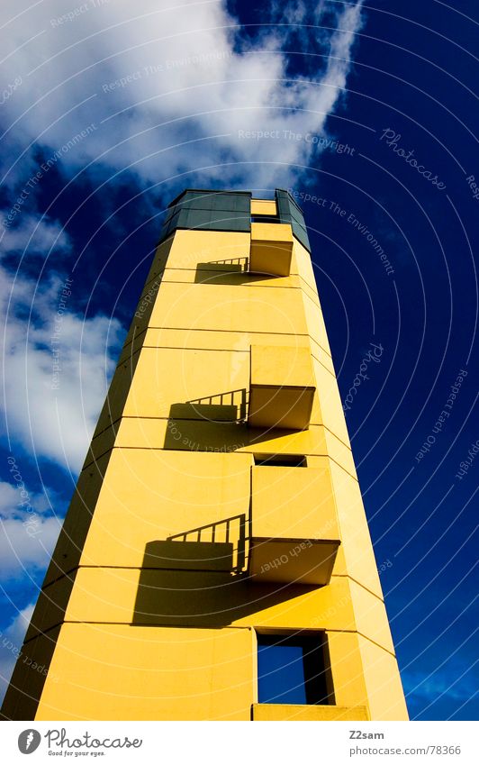fire tower II Building Threat Manmade structures Balcony Window Yellow Small Sky Blue Square Left Clouds Fire department Tower Tall Construction site Upward