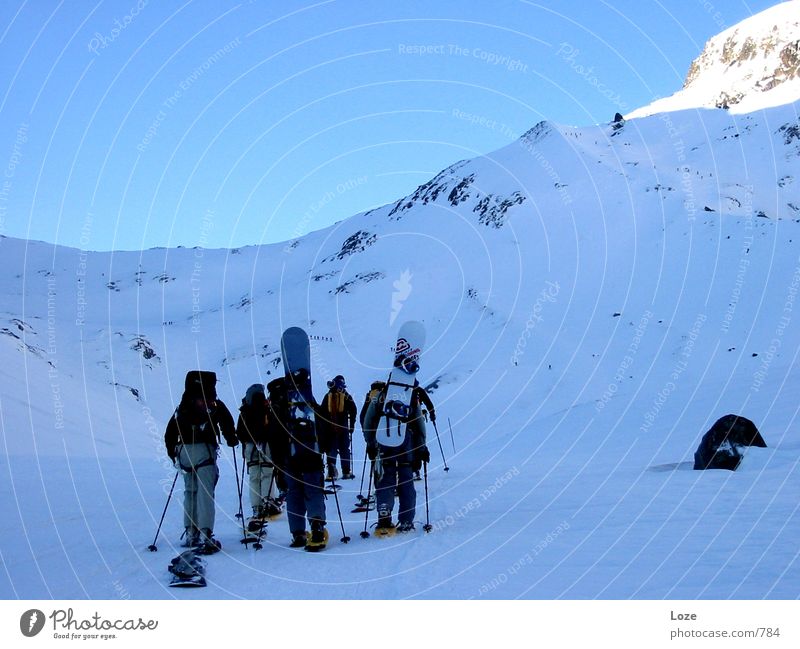 letour 03 #4 Mountaineering Snowboard Morning Alps Snowscape Exterior shot Colour photo Group Friendship Upward Snowcapped peak Winter's day Shadow Together