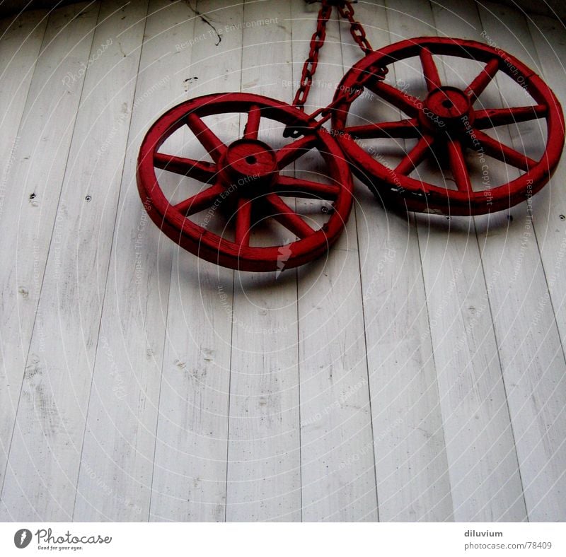 red wheels Red Wood Wall (building) White Carriage Hang Chain Old Varnish Contrast Shadow