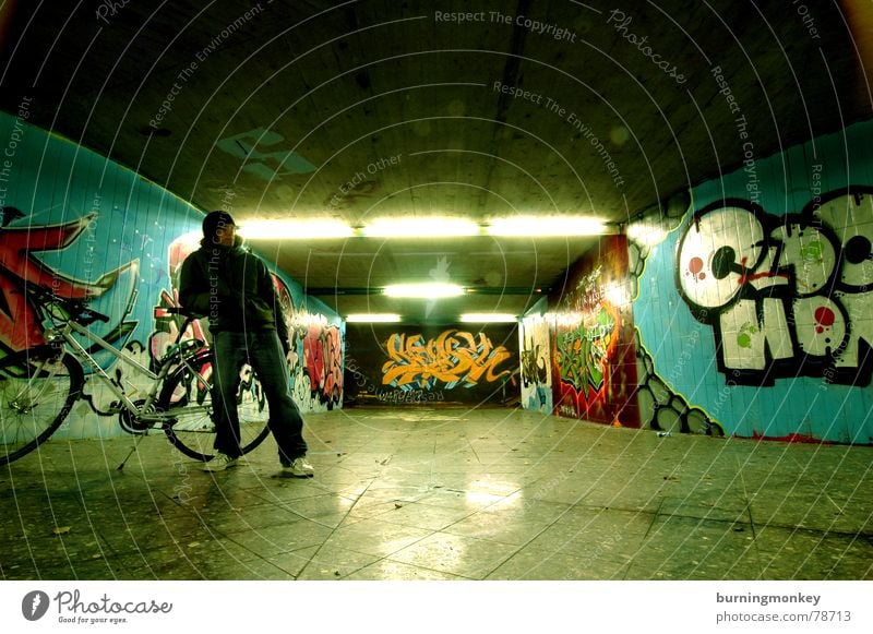 Underpass I Tagger Neon light Mural painting Man Reflection Tunnel Fellow Fluorescent Lights bicycle Human being Guy Graffiti
