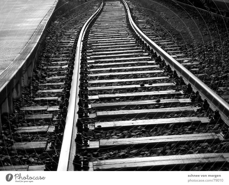 on the wrong track Vanishing point Side by side Long-winded Railroad tracks Plank Asphalt Vertical Infinity Black Gray Parallel Gloomy Badlands Engines