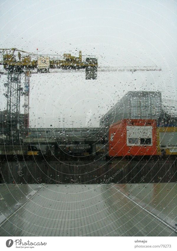 rain disc Rain Window pane Industrial district Gloomy Crane Gray Wet Construction site Dreary Pane Industry Harbour Hamburg Container Drops of water