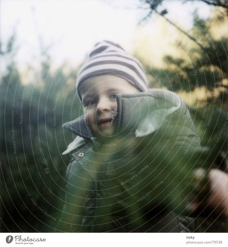 Rosa in the Wood Forest Child Green Playing Portrait photograph Cap Winter Nature polaroid ®