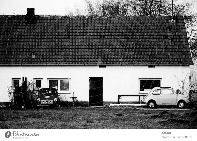 minis Small car Carriage Vehicle Parking Window House (Residential Structure) Meadow Black/White Outside the door. bmw Door Black & white photo Location