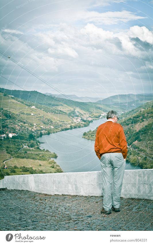 prospect Human being Masculine Man Adults Male senior 1 Hill River bank Looking Vantage point Clouds Douro Portugal Colour photo Exterior shot Copy Space top