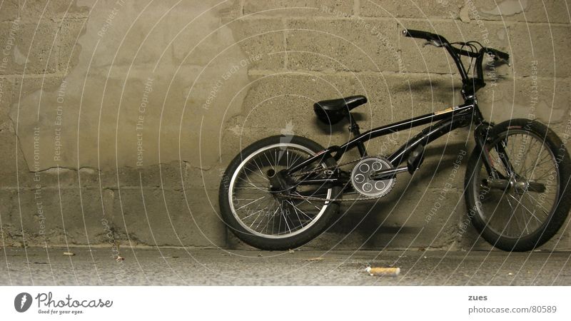 bmx on the wall BMX bike Wall (building) Bicycle Night Garage Floor covering Black London Underground Sports Marburg Means of transport Vehicle