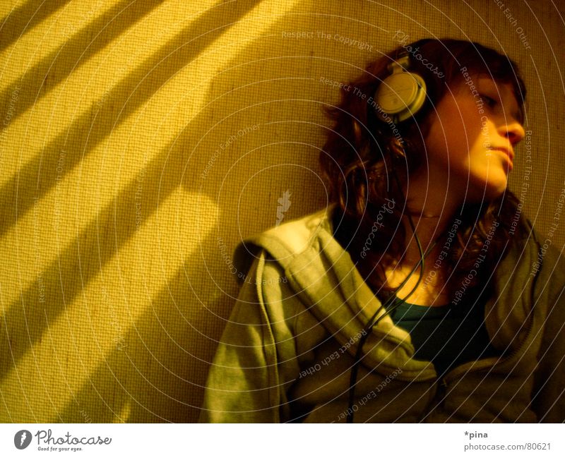 thinking about Woman Thought Dream Occur Go under Headphones Remember Absentminded Light Think Listen to music Emotions Relaxation Listening Music Shadow