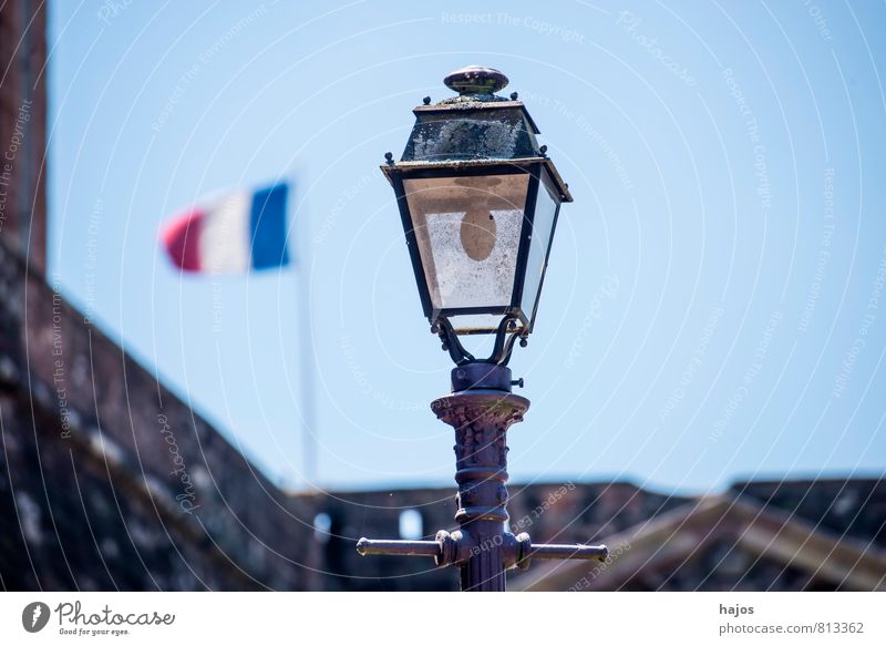 French flag with street lamp Wind France Town Downtown Old town House (Residential Structure) Sign Flag Blue Red White Pride Politics and state Street lighting