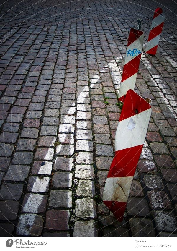 somewhere in Moabit Red Striped Diagonal Across Traffic lane Cobblestones Line Signage Traffic infrastructure Signs and labeling Street Crazy Lanes & trails