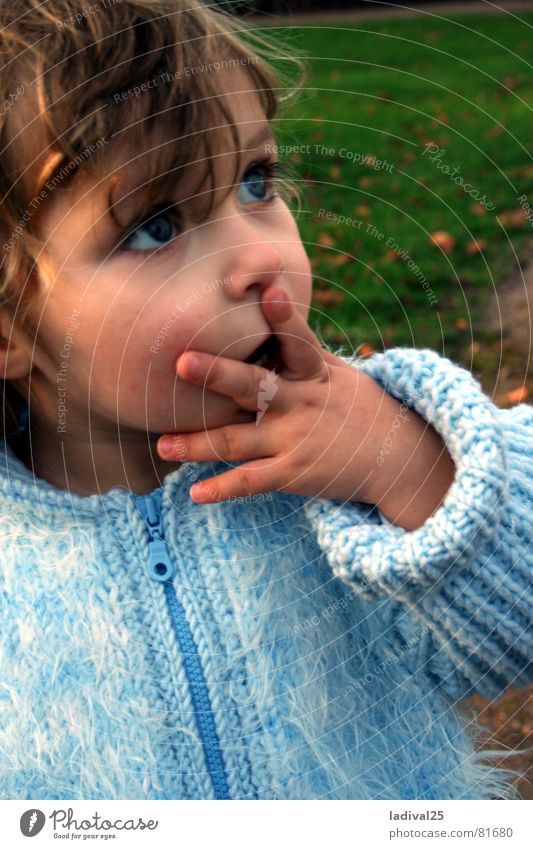 na uuuuui ... Colour photo Exterior shot Twilight Profile Looking Upward Child Toddler Eyes Fingers Jacket Coat Curl Blue Amazed Marvel
